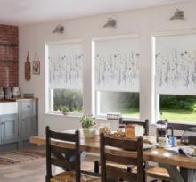 White roller blinds in a dining room