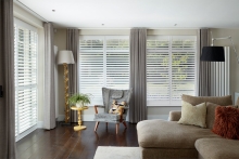 Our white shutter blinds in a lounge setting